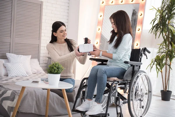 Virtual Experiments Jolly Friend Crippled Woman Holding Headset Smiling — Stock Photo, Image