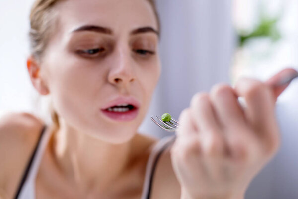 Selective focus of a green pea