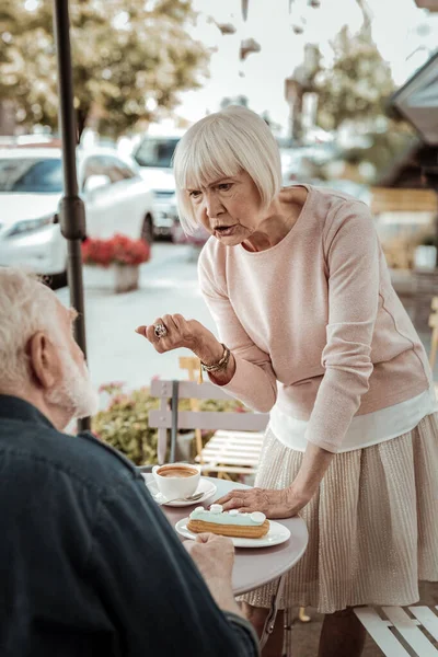 Nice aged woman arguing with her husband — Stock Photo, Image