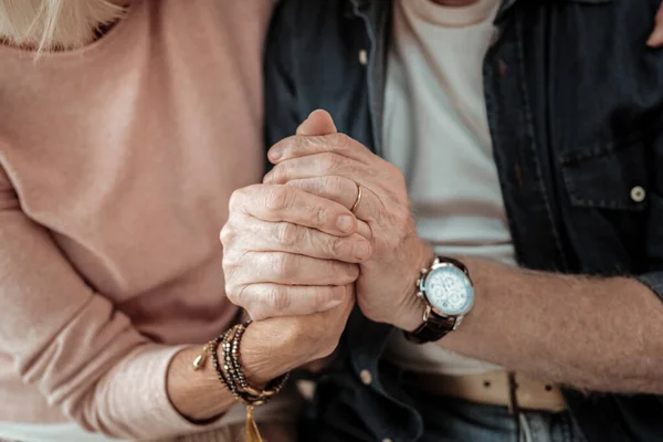 Close up of two hands being held together — Stock Photo, Image