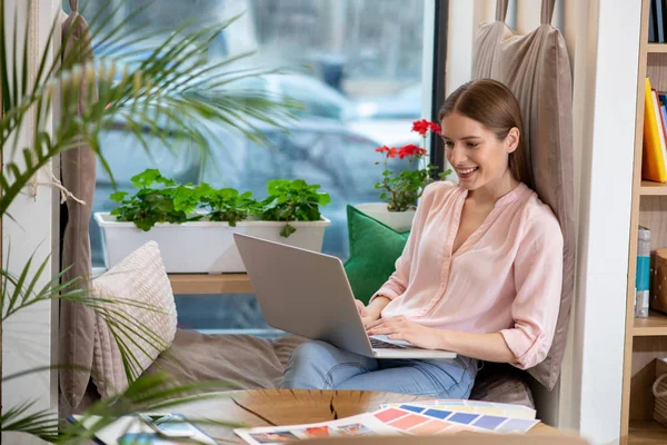 Young and creative designer working in a cosy place — Stock Photo, Image