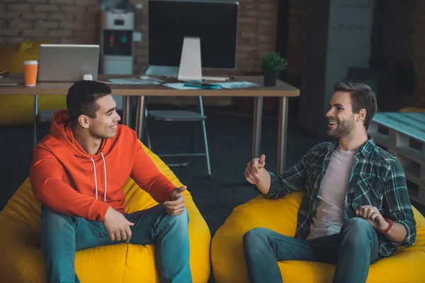 Joyful nice men enjoying their pleasant conversation — 스톡 사진