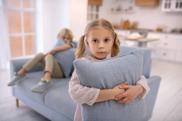 Blond sister and brother feeling sad after the conflict — 스톡 사진