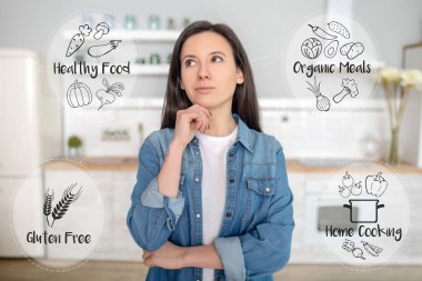 Woman thinking about preparing a tasty dish