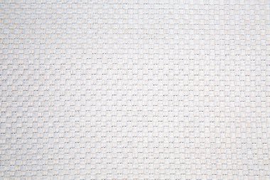 Arka plan, küçük karelerden oluşan beyaz renkli hafif bir tekstil malzemesinden yapılmıştır. İç, arka plan, yapı.