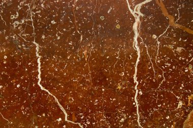 Doğal yapı parlak açık kahverengi mermer doku ve güzel beyaz çizgiler veya arka plan tasarım için kullanılabilir. Arkaplan, dokular, iç mekan.