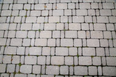 Yapay taş dikdörtgen gri rengin kaldırım manzarası grafik tasarım için doku arka planı. Doğal taştan yapılmış duvar kâğıdı soyut çizimleri.