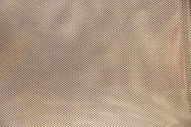 Metal şekilli ızgaranın arka planında güzel metal delikler var. Arkaplan, yapılar, tasarımlar.