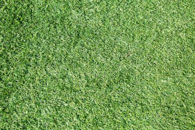 Sahte yeşil çimenlerin arka planı. Doku geçmişi. Sahte yeşil çimenlerin arka planı, futbol tenisi basketbolu, doku geçmişi....