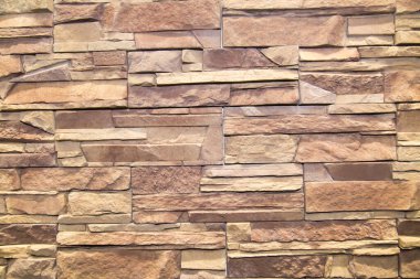 Çeşitli boyutlarda düzensiz dikdörtgen şeklindeki leylak sarısından yapay taşın arka planı. Arkaplan, doku ve tasarım.