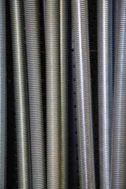 Güzel iplik yapısı, inşaat, metrik bağlayıcılar, arkaplan, tasarım ve galvanizli çelik çivilerin görüntüsü.