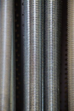 Güzel iplik yapısı, inşaat, metrik bağlayıcılar, arkaplan, tasarım ve galvanizli çelik çivilerin görüntüsü.