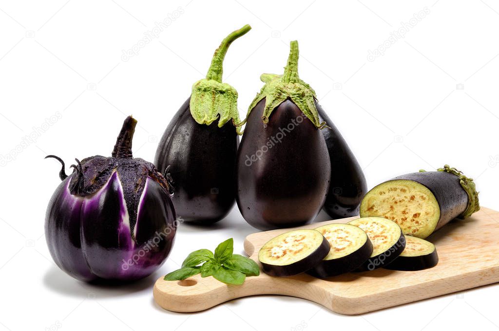 Fresh purple eggplant on white background.