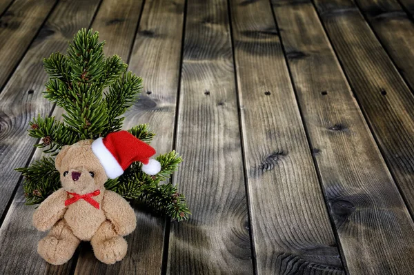 Weihnachten Teddybär auf Holz Hintergrund — Stockfoto