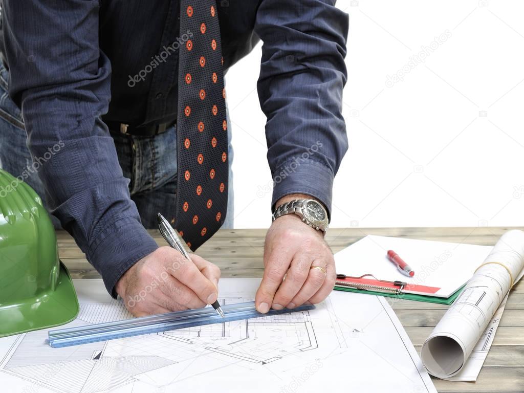 Architect works on the project of a residential building