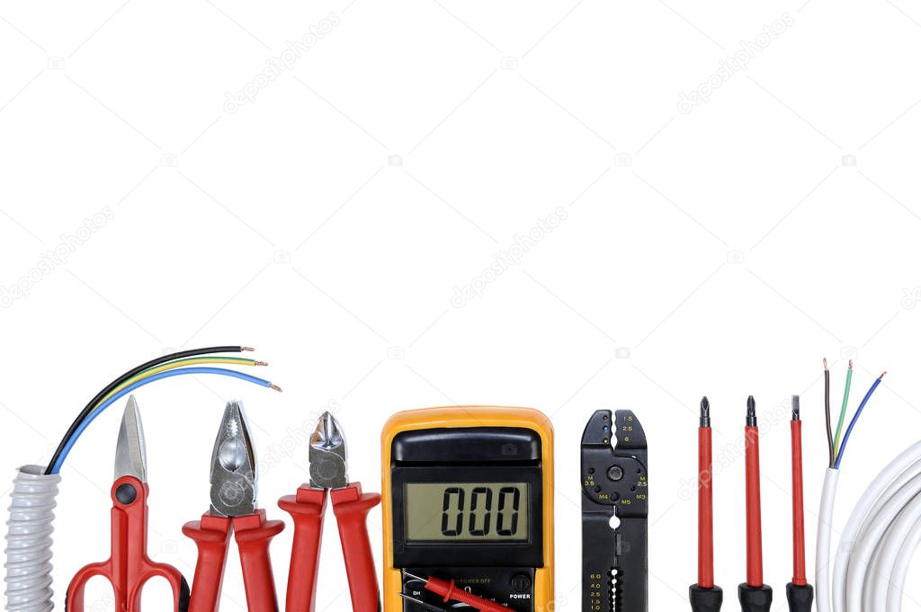 Top view of work tools for residential electrical installation on white background.