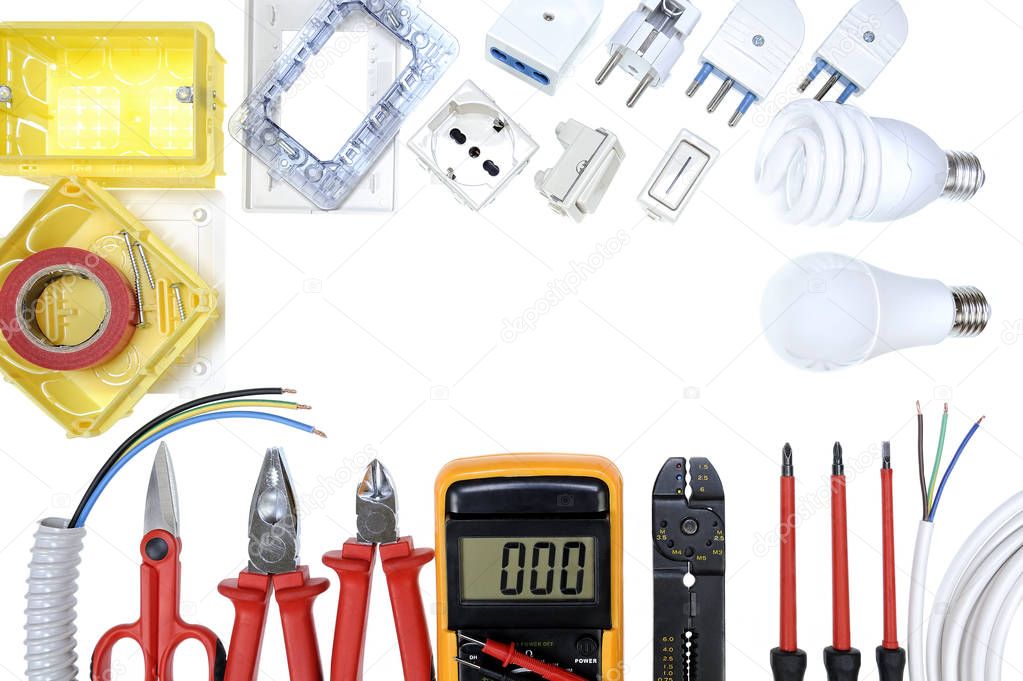 Top view of work tools and components for residential electrical installation on white background.