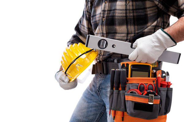 Electrician holds the level in his hand, helmet with protective goggles. Construction industry, electrical system. Isolated on a white background.