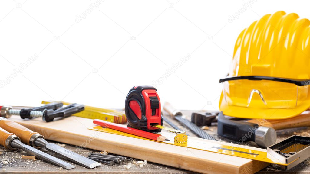 Close-up. Carpenter's workbench  with tools for woodworking. Construction industry. Isolated on a white background.