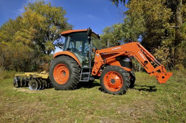 Kubota tractor with front end loader clipart