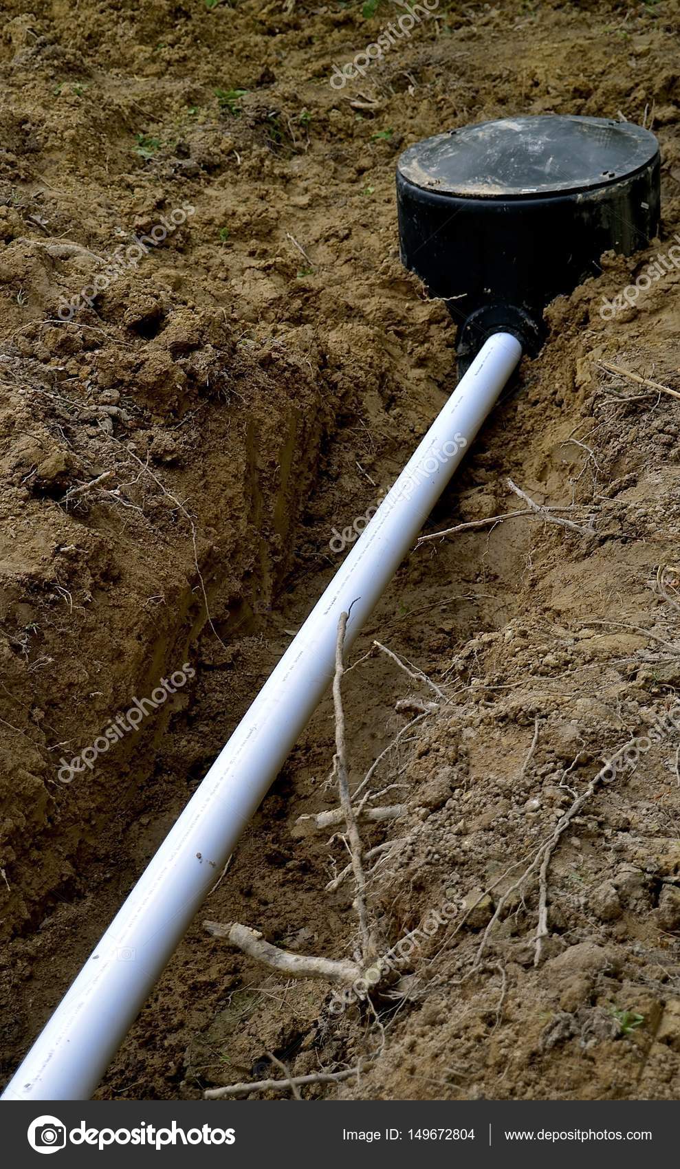 PVC pipe leads to septic tank — Stock Photo © fiskness 149672804