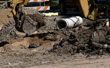 Excating kova kaşık toz parçaları asfalt