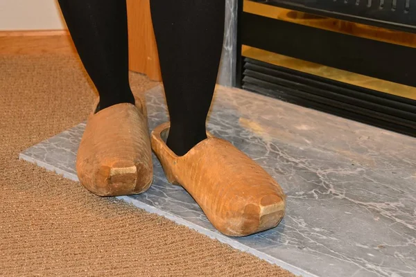 Girl Wearing Oversized Carved Wooden Dutch Shoes — 스톡 사진