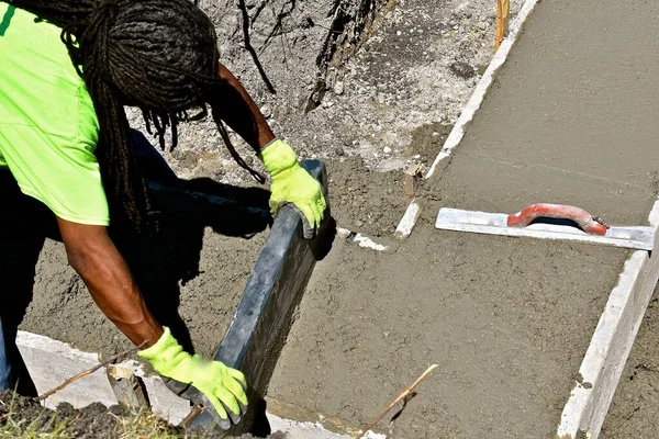 Concrete Worker Pushes Mud Leveling Effort Basement Footing — Stock Photo, Image