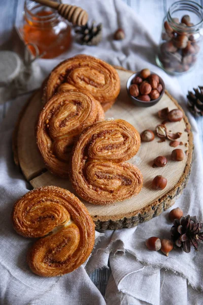 Palmier pastry and hazelnuts — Stock Photo, Image
