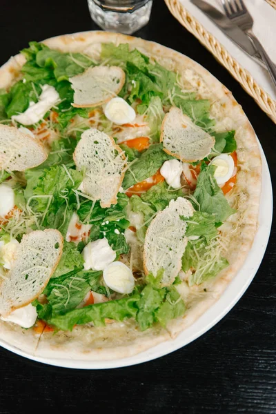 Salad pizza mix with mozzarella and lettuce