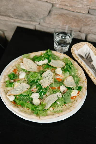 Salad pizza mix with mozzarella and lettuce