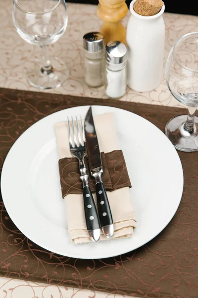 Fork and knife on napkin Stock Photo