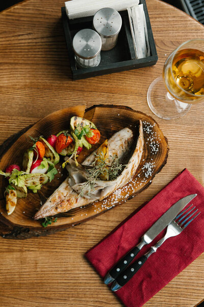 Roasted fish steak and grilled vegetables