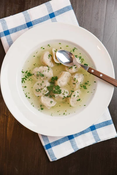 Hot soup with dumplings