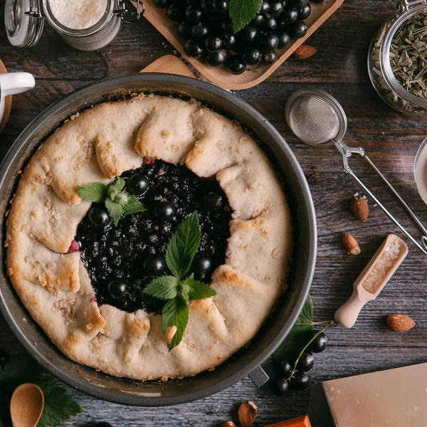 blackcurrant pie in baking pan