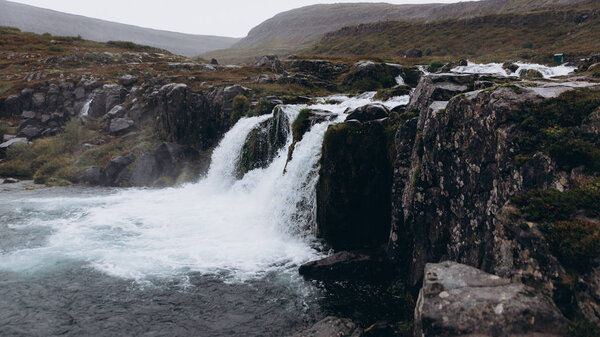 mountain landscape with waterfall