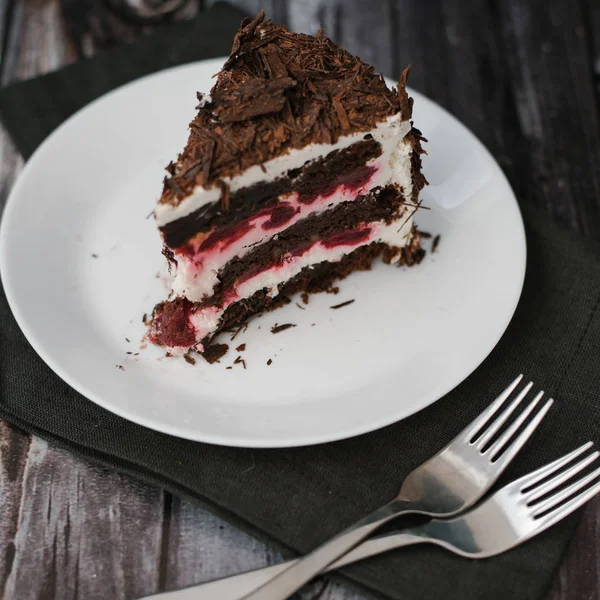 Chocolate Cake Piece Cherries Yoghurt Filling Served White Plate Forks — Stock Photo, Image