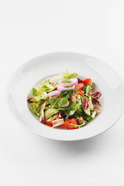 Vegetables vegetarian salad in white plate