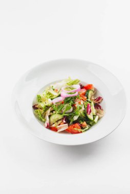 Vegetables vegetarian salad in white plate