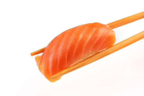 Bacchetta Con Rotolo Sushi Nigiri Isolato Sfondo Bianco — Foto Stock