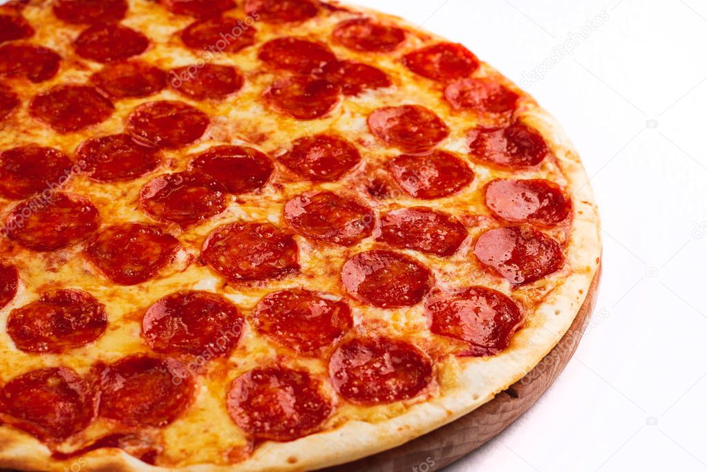 pepperoni pizza, closeup view on white background