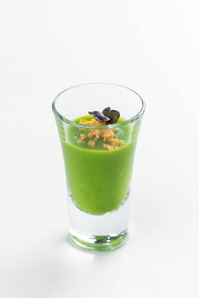 green smoothie glass isolated on white background