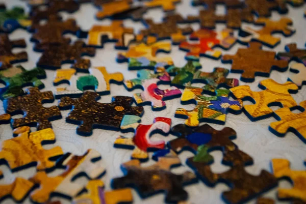 Close Peças Coloridas Quebra Cabeça Pedaços Puzzle Virados Para Cima — Fotografia de Stock