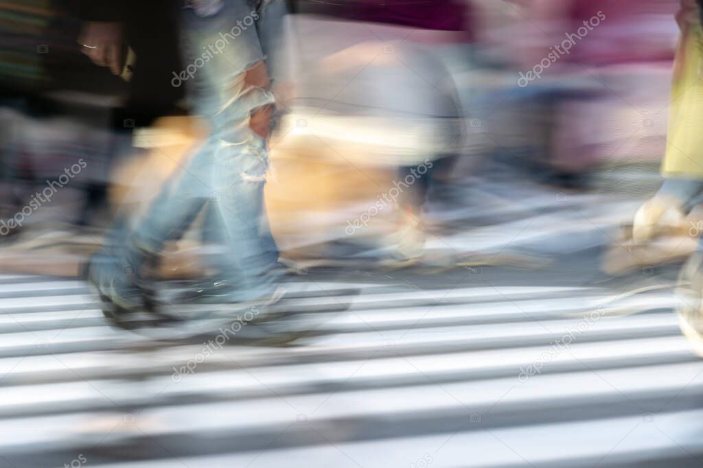 Blurred people in Shibuya crossroads, Japan