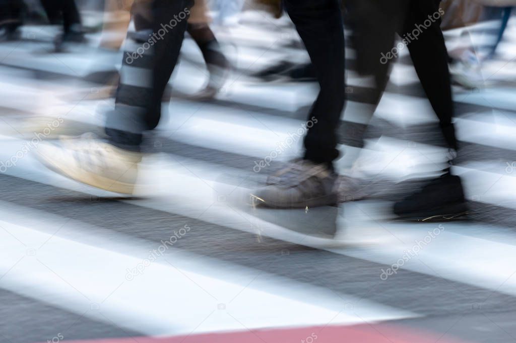 Blurred people in Shibuya crossroads, Japan