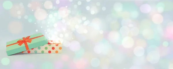 Christmas minimalism banner. Gift box, beautiful side. Pastel background.