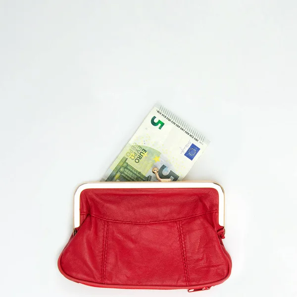 Euro-Schein steckt im roten Portemonnaie. Stockfoto