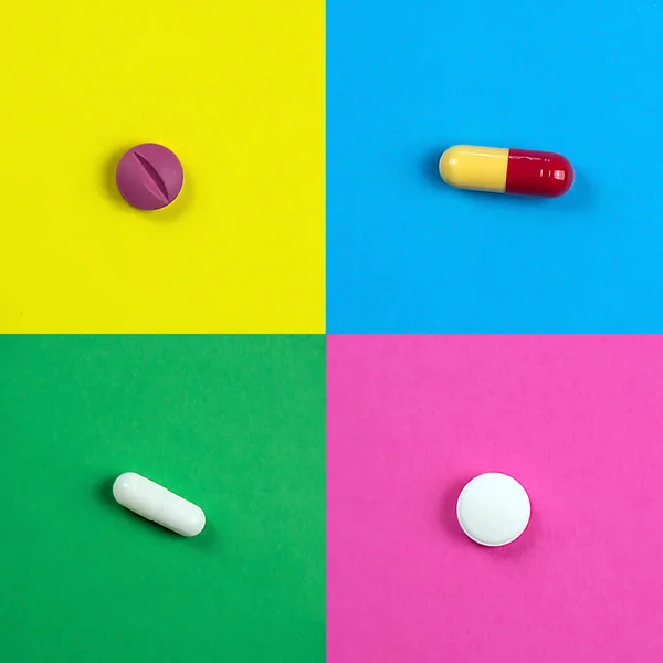 Renkli arkaplanda farklı şekillerde haplar.