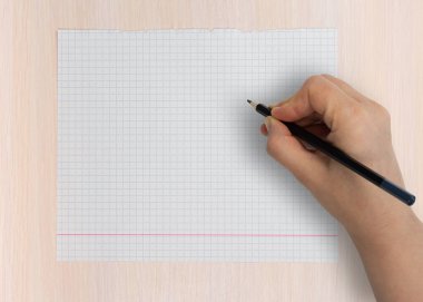 Kadın eli boş bir defter kağıdına kurşun kalemle yazacak.
