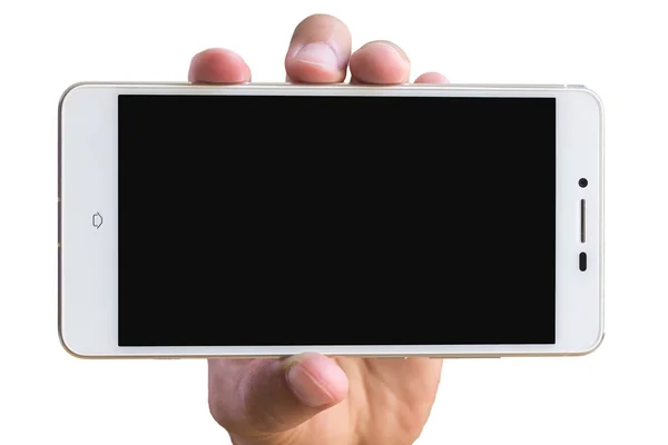 Мужчина держит смартфон в руках на белом фоне — стоковое фото